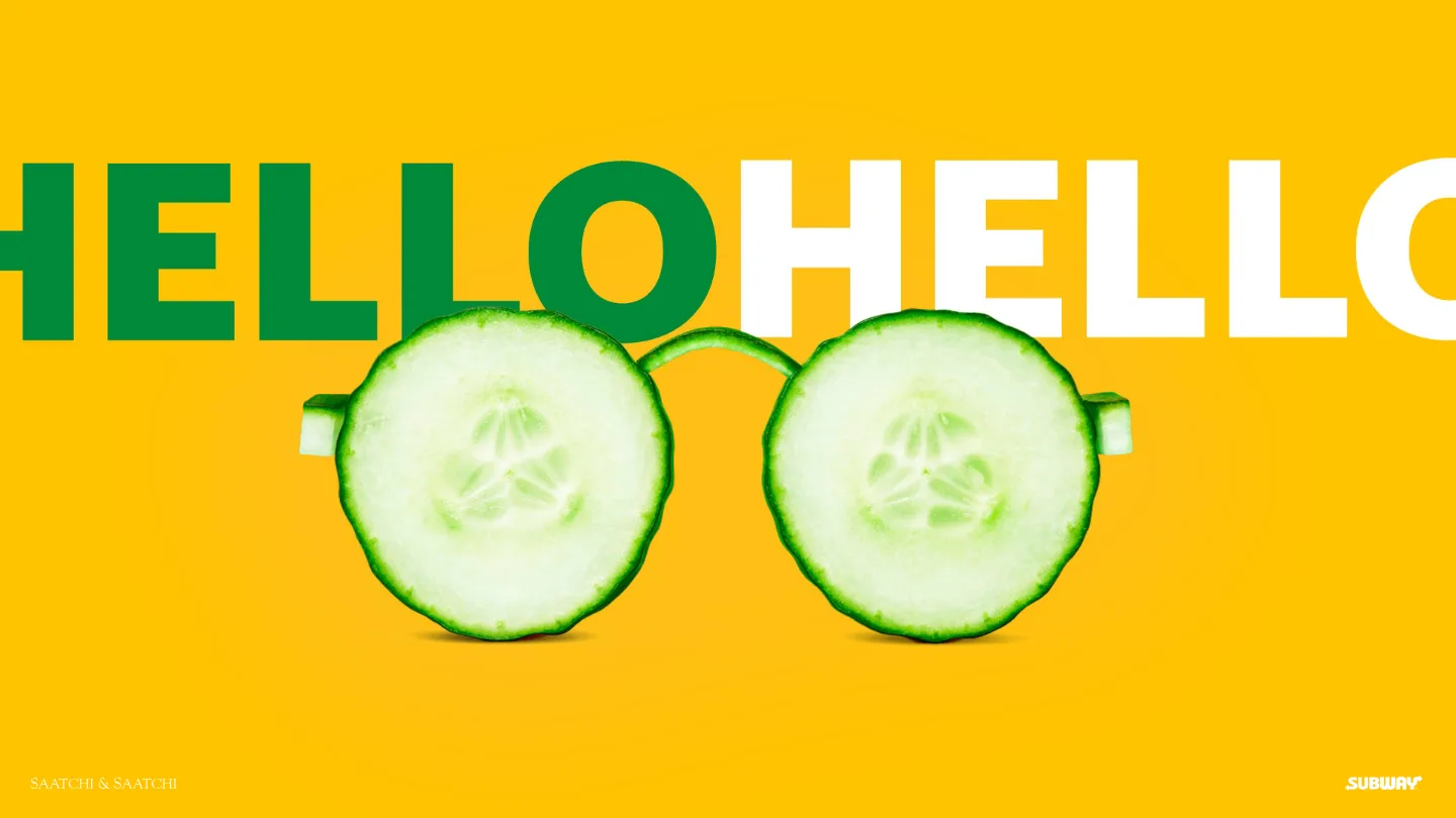 Slide with HELLO in giant type and a pair of cucumber-slice sunglasses on yellow.